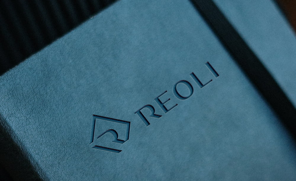 projekt logo firmy Reoli